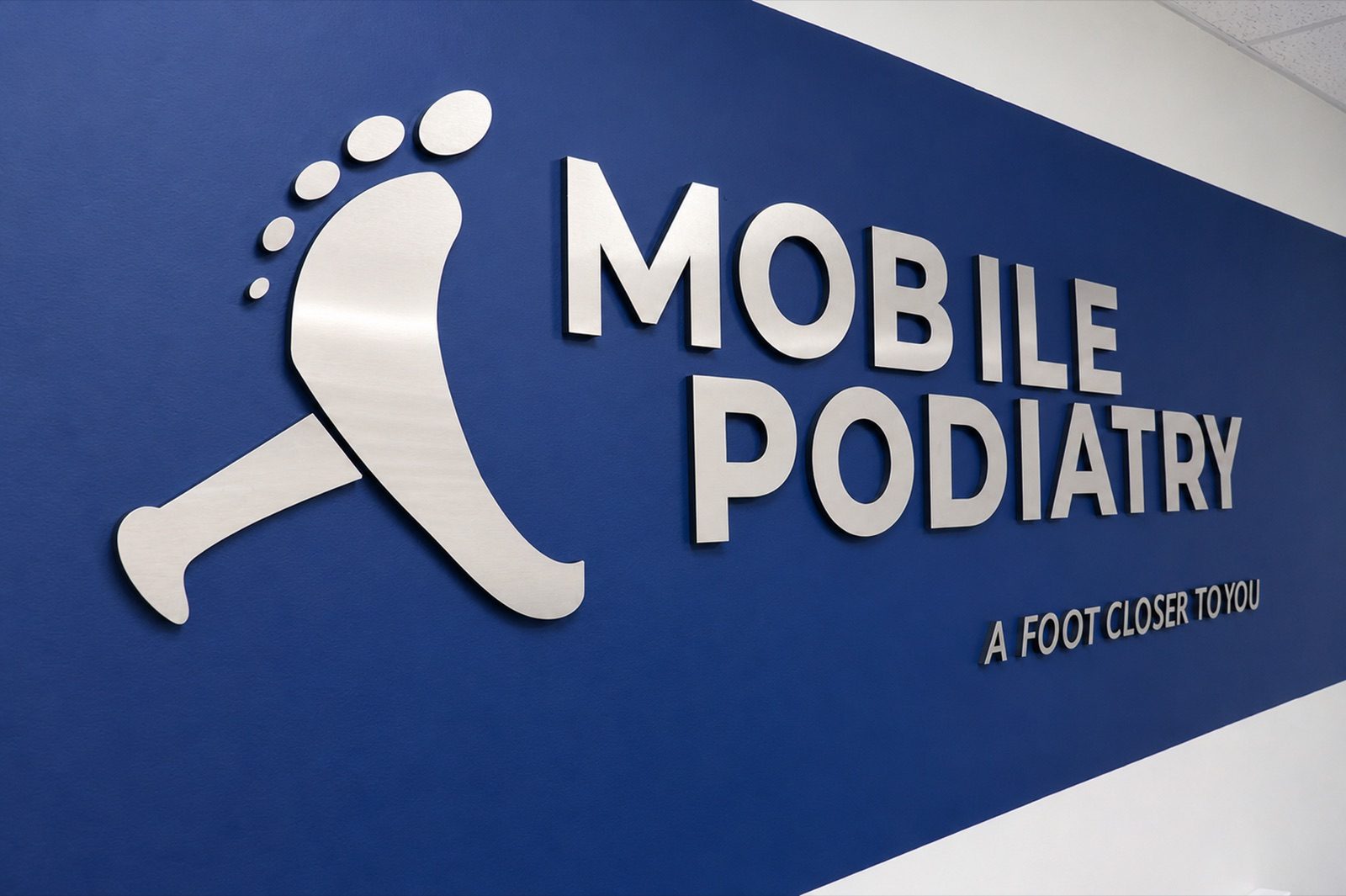 Mobile Podiatry NYC wall sign in a blue clinic interior